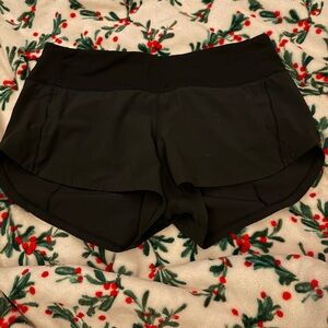 2 pairs of black lululemon 2.5in regular athletic shorts